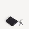 Bolsa com fecho e pingente para homem, em preto