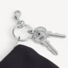 Bolsa com fecho e pingente para homem, em preto