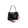 Bolsa de mão pequena Rodeo com efeito usado e um pingente «Preto» 7897792AA831000
