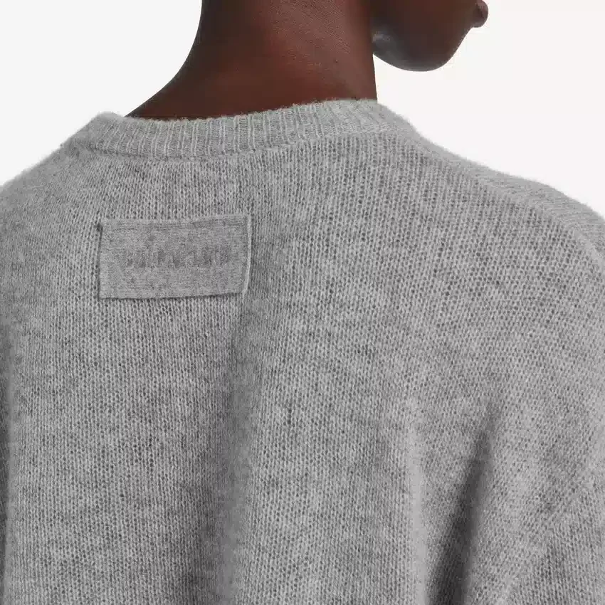 Camisola curta de gola redonda para mulher em cinzento mesclado Camisola curta de gola redonda para mulher em cinzento mesclado