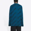 Camisola de malha de lã com gola redonda e logótipo por toda a peça «Azul Petróleo» 657400T15672470