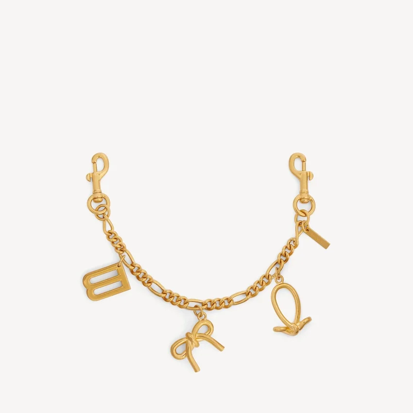 Corrente para chaves de senhora com pingentes em dourado Corrente para chaves de senhora com pingentes em dourado