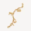 Corrente para chaves de senhora com pingentes em dourado Corrente para chaves de senhora com pingentes em dourado