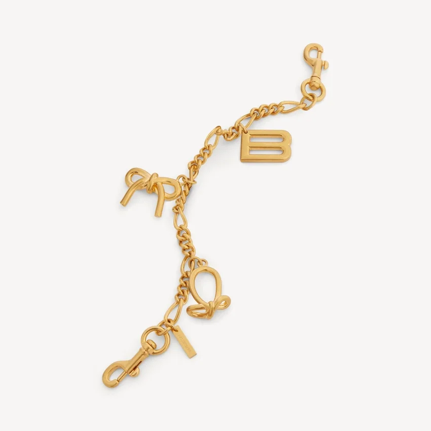 Corrente para chaves de senhora com pingentes em dourado Corrente para chaves de senhora com pingentes em dourado