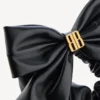 Elástico de cabelo Clemence XL para mulher em preto/dourado