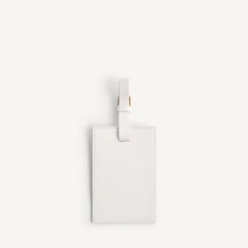 Etiqueta de bagagem com perfumes em branco marfim dix