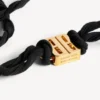Gargantilha feminina «nano ribbon bb» em preto/ouro brilhante