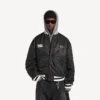 Jaqueta «Coach» de Balenciaga para homem | Colaboração com a NBA, em preto Jaqueta «Coach» de Balenciaga para homem | Colaboração com a NBA, em preto