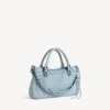 Mala City First para mulher em azul claro
