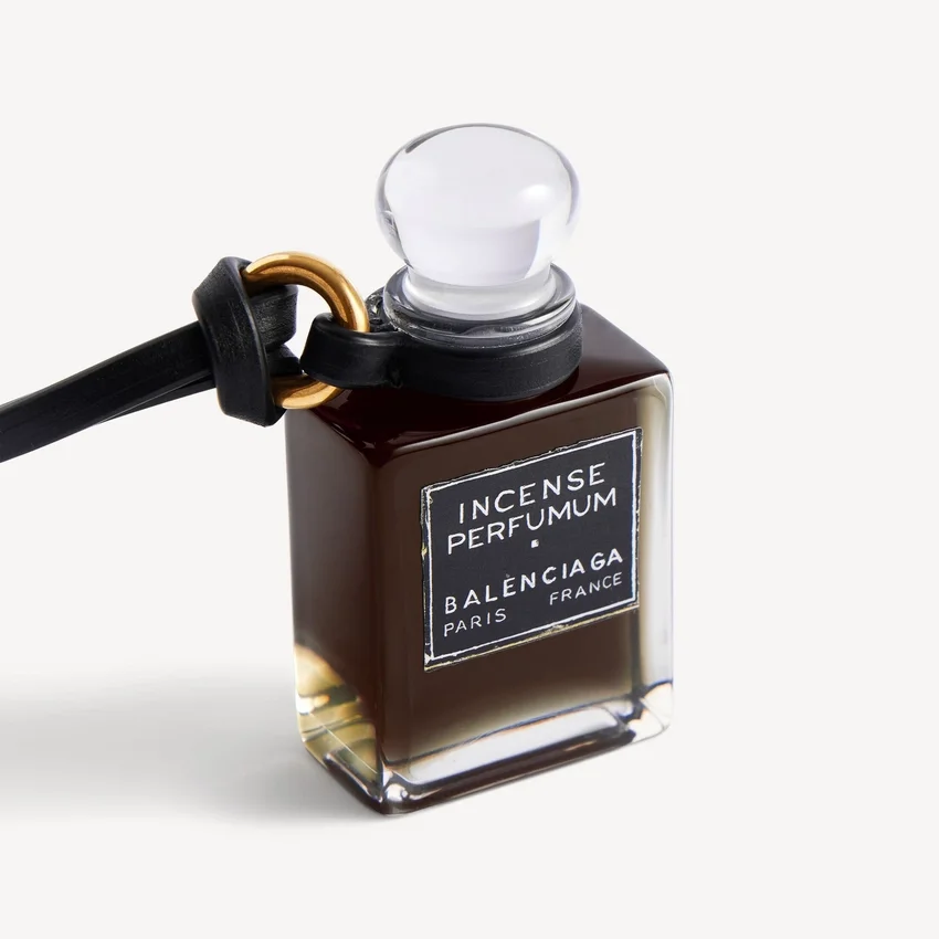 Pingente em forma de frasco de perfume em miniatura, na cor preta Pingente em forma de frasco de perfume em miniatura, na cor preta