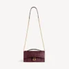 Pochette feminina em forma de Hourglass com corrente em bordô escuro Pochette feminina em forma de Hourglass com corrente em bordô escuro