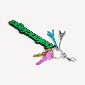 Porta-chaves/charm Balenciaga estilo motoqueiro para mulher em verde/preto