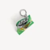 Porta-chaves com pingente «chips» em verde Porta-chaves com pingente «chips» em verde