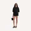 Saia-calções mini de corte elegante para mulher em preto