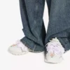 Sapatilha de corrida com laços para mulher em branco/rosa Sapatilha de corrida com laços para mulher em branco/rosa