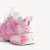 Sapatilha de track de mulher com logótipo em estêncil, em rosa/branco Sapatilha de track de mulher com logótipo em estêncil, em rosa/branco