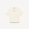 T-shirt feminina Balenciaga com design nas costas e corte médio, na cor creme