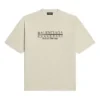 T-shirt Retail Therapy de corte médio «Ivory Black» 612966TLVB19054